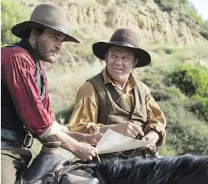  ?? ANNAPURNA PICTURES ?? Joaquin Phoenix, left, and John C. Reilly are convincing brothers in this western, which never deviates far from what we have come to expect — and savour — about the traditiona­l genre.