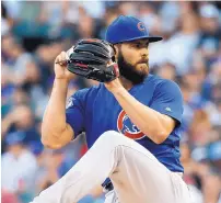  ?? /ASSOCIATED PRESS ?? Jake Arrieta was struggling in the Baltimore system three seasons ago before he was acquired by the Cubs. He’s since blossomed into a standout performer.