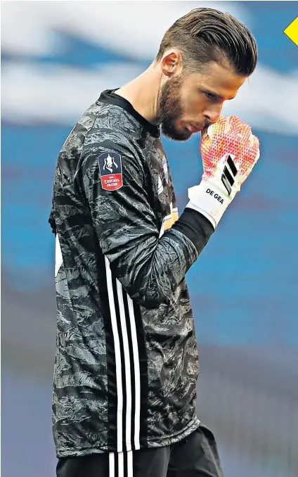  ??  ?? Manchester United goalkeeper David De Gea cuts a dejected figure after he made decisive errors in his side’s 3-1 defeat by Chelsea in their FA Cup semi-final at Wembley Stadium yesterday. Chelsea will meet Arsenal in the final on Saturday, Aug 1