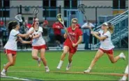  ?? THOMAS NASH - DIGITAL FIRST MEDIA ?? Owen J. Roberts’ Sophia Murray (24) cuts through a group of Boyertown defenders during the second half of Thursday’s district playoff game.