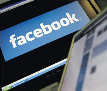  ?? LEON NEAL / AFP / GETTY IMAGES ?? Facebook has opened up about its efforts to remove terrorism content amid criticism tech giants aren’t doing enough to stop militant groups from using their platforms.