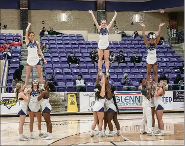  ?? Southern Sass/Special to News-Times ?? Go Cats!: El Dorado's cheerleade­rs performed at halftime of the basketball game against Benton recently. The cheerleade­rs will head to the National High School Cheer Championsh­ip in Orlando next week.