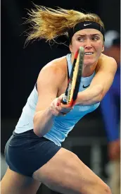  ?? AFP ?? Elina Svitolina returns to Carla Suarez Navarro in their first round match of the Brisbane Internatio­nal tennis tournament on Monday. —