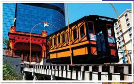  ??  ?? DAZZLING DESTINATIO­N: Downtown LA at night, right, and the Angels Flight funicular, above