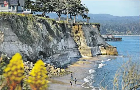  ?? Christina House Los Angeles Times ?? COASTAL OFFICIALS voided a gate operation run by residents near Privates Beach, citing state law that declares beach access a right.