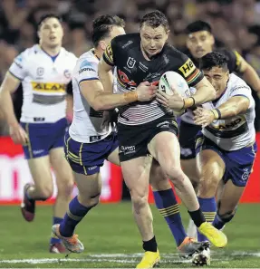  ?? PHOTO : GETTY IMAGES ?? On the charge . . . Panthers fullback Dylan Edwards bursts upfield during the qualifying final against the Eels in Penrith earlier this month.