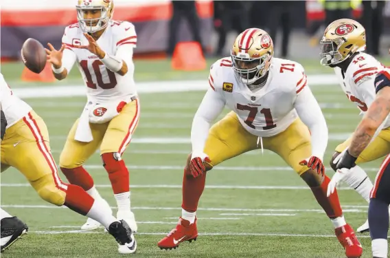  ?? Winslow Townson / Associated Press ?? Offensive tackle Trent Williams (71) tested positive for the coronaviru­s and is in a highrisk category because he is a cancer survivor.