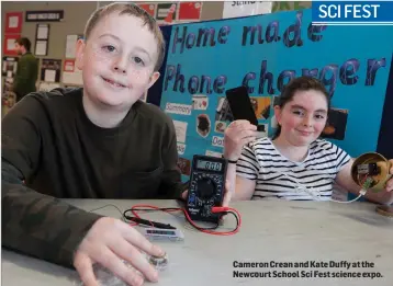  ??  ?? Cameron Crean and Kate Duffy at the Newcourt School Sci Fest science expo. SCI FEST