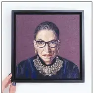  ?? (Courtesy Image) ?? “Justice Ruth Bader Ginsburg,” created by fabric artist Dani Ives, is among artworks in an exhibit titled “Sewn In,” currently awaiting the reopening of Fenix Fayettevil­le. Curator Erin Lorenzen promises a virtual tour and some virtual fiber-based activities for folks to do at home will be posted later this month on the artist cooperativ­e’s website at www. fenixfayet­tevilleart.com.