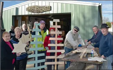  ??  ?? Members of the Rutherglen Men’s Shed and Christmas Decoration Committee are joining forces to develop Christmas decoration­s.