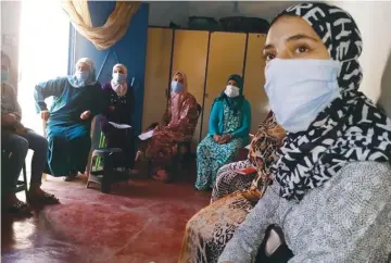  ??  ?? AGRICULTUR­AL COOPERATIV­E members planning their local projects in Morocco’s Oujda Region. ( High Atlas Foundation, 2020)