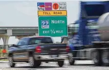  ?? Brett Coomer/staff photograph­er ?? After pausing a formula-prescribed 9.76 percent increase in state toll road rates in September, the Texas Transporta­tion Commission approved a 2.2 percent increase last week.