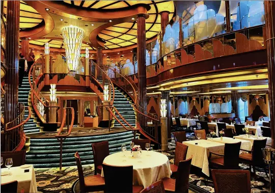  ?? ?? The Britannia Restaurant aboard the Cunard Line's Queen Elizabeth, which will operate on the West Coast for two months starting May 30.