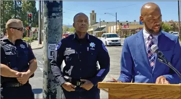  ?? JUDITH PRIEVE — STAFF ?? Antioch Mayor Lamar Thorpe, right, speaks at a news conference Monday at the corner of 18th and A streets where a sideshow damaged a police vehicle over the weekend. Authoritie­s are vowing to crack down on the illegal street activity.