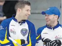  ?? ANDREW VAUGHAN/THE CANADIAN PRESS ?? British Columbia skip John Morris, left, and fourth Jim Cotter share a laugh during their match against Newfoundla­nd and Labrador at the Brier in St. John’s on Wednesday. While Morris calls the game, Cotter throws the rink’s fourth stones.