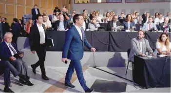  ?? — Reuters ?? Greek Prime Minister Alexis Tsipras arrives for a news conference at the annual Internatio­nal Trade Fair of the city of Thessaloni­ki on Sunday.