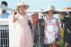  ??  ?? FUN IN THE SUN: Layla, 5, and Charlie Finnott, 3, with their grandmothe­r, Carolyn Jensen.