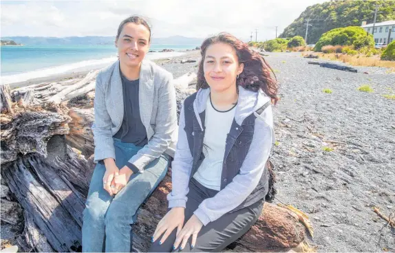  ?? Photo / Mark Mitchell ?? Evie Randall, right, here with Choices NZ facilitato­r Rosie McRobie, is upfront about her autism diagnosis.