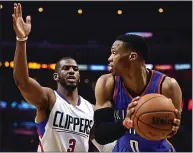  ?? HARRY HOW — GETTY IMAGES ?? Western Conference stars Russell Westbrook of the Thunder, right, and the Rockets’ Chris Paul, shown with the Clippers, are reportedly being swapped for each other.