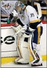  ?? AP/ GENE J. PUSKAR ?? Nashville goalie Pekka Rinne stopped seven shots in Monday night’s game against Pittsburgh, but he allowed two goals in the game’s fi nal 3: 17 that gave the Penguins the victory.