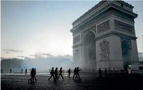  ?? AP ?? Riot police take control at the Arc de Triomphe during a demonstrat­ion against rising the fuel taxes.