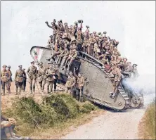  ?? GEORGE METCALF ARCHIVAL COLLECTION, CANADIAN WAR MUSEUM. IMAGE COLOURIZED BY CANADIAN COLOUR ?? Canadian soldiers pose with captured German tank.