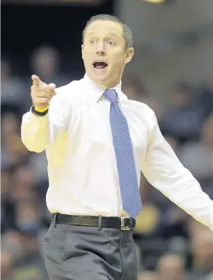  ?? MARK HUMPHREY/AP ?? Gator fans on social media are pointing the finger at basketball coach Mike White.