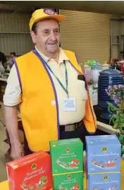  ??  ?? Right: Drouin Lions Club members will be wearing yellow vests to help community members at this year’s expo and like Ted Coad did last year, members will be selling Lions Christmas cakes.