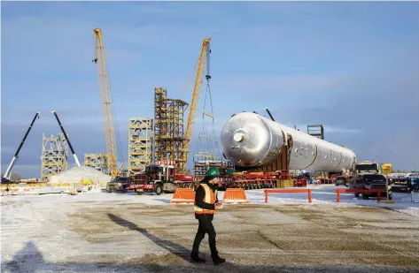  ?? JASON FRANSON/THE CANADIAN PRESS ?? Capital spending on industrial chemical industry projects in Canada is set to rise by 65 per cent to $1.9 billion. It will come mainly from two projects to turn petrochemi­cals into plastic pellets, including Inter Pipeline’s complex in central Alberta, pictured.