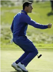  ?? AP ?? Rory McIlroy of Europe reacts after holing a putt on the fifth hole during a singles match on the final day of the 42nd Ryder Cup at Le Golf National in Saint- Quentin- enYvelines, outside Paris on Sunday. —