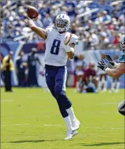  ?? GETTY IMAGES ?? Third-year Tennessee quarterbac­k Marcus Mariota appears back to full speed after breaking his right leg in a Week 16 loss at Jacksonvil­le last season.
