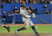  ?? CHRISTOPHE­R KATSAROV — THE CANADIAN PRESS ?? The Yankees’ Aaron Judge (99) strikes out during the eighth inning against the Blue Jays on Wednesday.