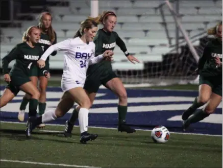  ?? RANDY MEYERS - FOR THE MORNING JOURNAL ?? Bay’s Kealy Sullivan moves the ball near the Madison goal during the first half of a regional semifinal Oct. 30.