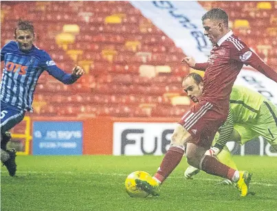  ?? Picture: SNS. ?? Jonny Hayes rounds off the scoring for Aberdeen in the 5-1 win over Kilmarnock.