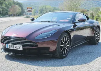  ?? PHOTOS: JIL MCINTOSH/DRIVING ?? The Aston Martin DB11 V-8 provides a smooth and comfortabl­e ride.