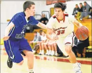  ?? Catherine Avalone / Hearst Connecticu­t Media file photo ?? A hard foul by a Hale-Ray player on East Hampton’s Colin Baker, left — shown in a January 2017 game against Cromwell — resulted in a broken wrist for Baker, threatenin­g text messages about the player responsibl­e and a suspension for East Hampton coach...