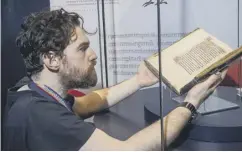  ?? ?? Ryan Gibson instals the Iona Psalter