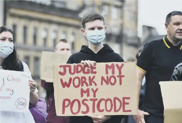  ?? Picture: John Devlin ?? 0 Students staged protests over exam downgradin­g in Glasgow