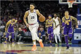  ?? CHRIS SZAGOLA — THE ASSOCIATED PRESS ?? Philadelph­ia 76ers’ Ben Simmons, of Australia, drives up the court during the second half of an NBA basketball game against the Los Angeles Lakers, Sunday, Feb. 10, 2019, in Philadelph­ia.