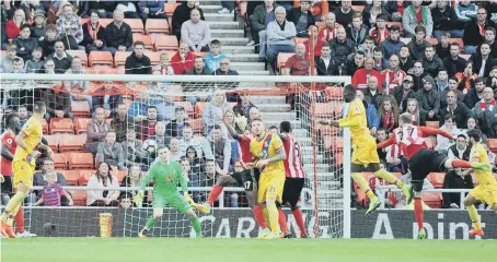  ??  ?? Christian Benteke heads in Crystal Palace’s uinjury-time winner.Picture: Frank Reid