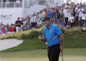  ?? ASSOCIATED PRESS ?? YES! Patrick Reed celebrates his victory at the Northern Trust yesterday.