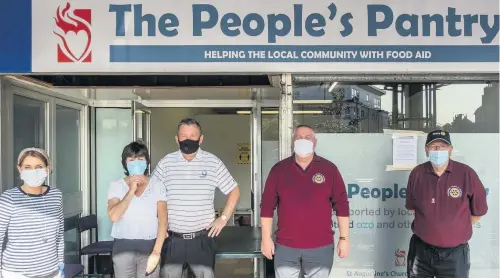  ??  ?? Community spirit (l-r) Hard-working volunteers Katrina, Sandra and Billy, club president Wilie Devoy and Rotarian Gordon Macphee delivered much-needed donations to the People’s Pantry Foodbank in Coatbridge