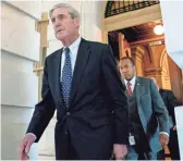  ?? ANDREW HARNIK/AP ?? Special counsel Robert Mueller has charged Russian nationals and businesses with trying to meddle in the 2016 presidenti­al election.