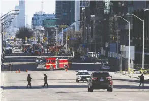  ?? COLE BURSTON / GETTY IMAGES FILES ?? Police investigat­e on Yonge St. near Finch Ave. after a van plowed into pedestrian­s on
April 23, 2018, killing 10 people. Alek Minassian has admitted to being the driver.