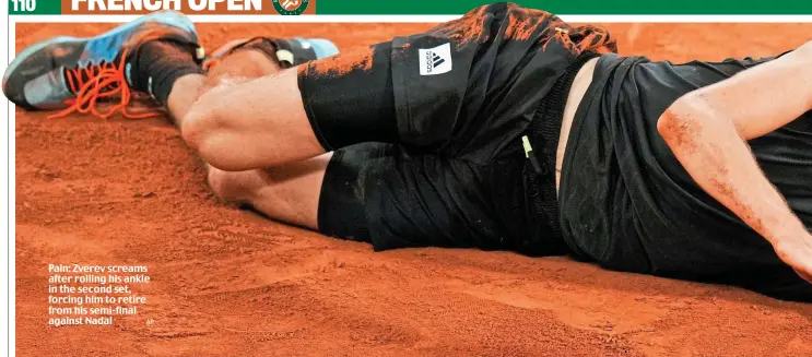  ?? AP ?? Pain: Zverev screams after rolling his ankle in the second set, forcing him to retire from his semi-final against Nadal