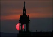  ?? KARL MONDON — STAFF PHOTOGRAPH­ER ?? The sun sets behind the spire of the Bank of Italy building Dec. 11, 2017. The building's long-awaited renovation will begin in weeks.