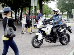  ?? Reuters ?? Finnish police patrols on motorbike after stabbings in Turku, Helsinki, Finland on Friday. —