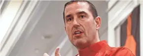 ?? LORI SCHMIDT / COLUMBUS DISPATCH ?? Wisconsin football coach Luke Fickell speaks to the OHSFCAC on Friday at the Easton Hilton 3.