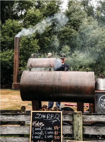  ??  ?? Above: Jay Sherwood of Lake & Wood Brew Co smokes meat at the Wet Jacket winery. Opposite: electric-biking across the Southern Discoverie­s suspension bridge over the Arrow RIver.