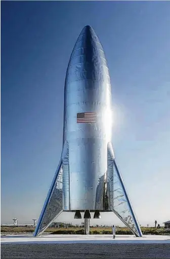  ?? Elon Musk via AFP / Getty Images ?? This image released by SpaceX earlier this year shows the test version of the Starship Hopper, which is undergoing testing at Boca Chica near Brownsvill­e.